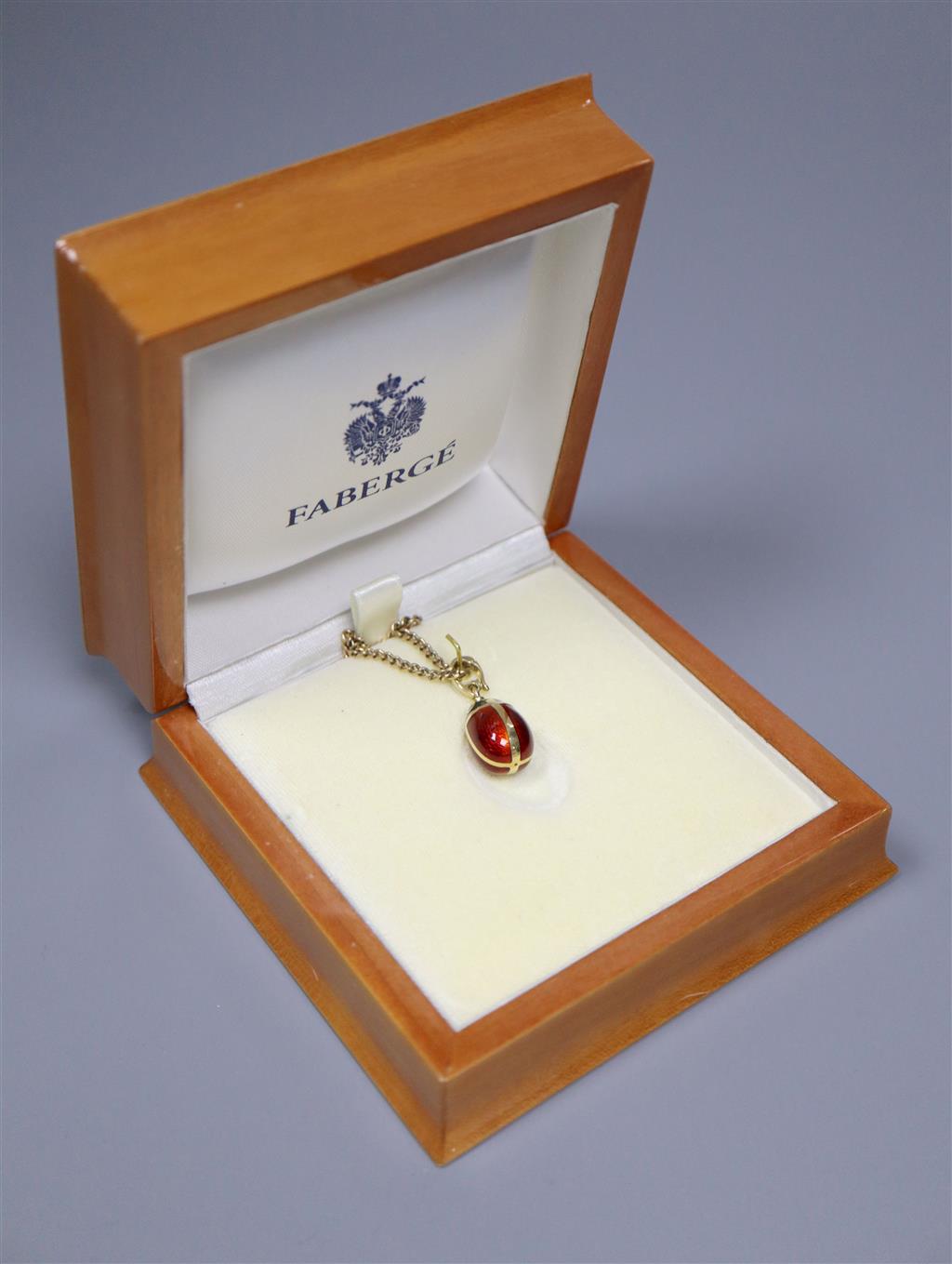 Victor Meyer for Faberge, an 18ct yellow gold and enamel ladybird pendant set with diamond eyes (no. 668/1000),